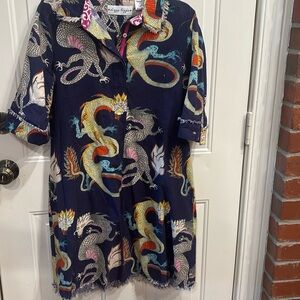 Tizzy Lizzy with a navy background print with dragons on it.